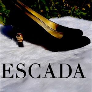 Escada 7.5 B black suede all leather ,gold unique heels in good condition.